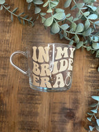 Bridal The Eras Bride Clear Mug | Swiftie Wifey Fan Glass Cup | Bride / Wifey Era themed cup/mug tea/coffee | Wedding Gift | Bride Merch - The Crafty Bee